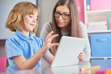 A tutor working one-to-one with a student
